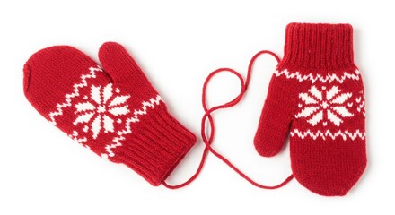red knitted mittens with snowflake pattern connected by string on white background for winter warmth