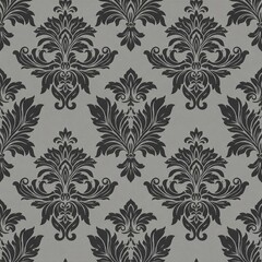 A gray damask pattern with an ornate relief design is on a clean gray surface. The texture is a piece of decorative and elegant wallpaper. Seamless repeatable texture.