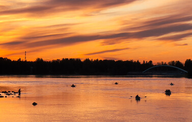 Naklejka premium Sunset Boating and Fishing on the Bothnian Bay, Finland, 2025