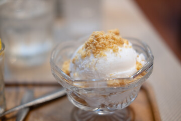 Bowl with balls of coconut ice cream. Summer ice cream dessert