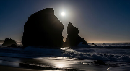 Dramatic Silhouetted Rock Formation at Coastline Under Moonlight Landscape