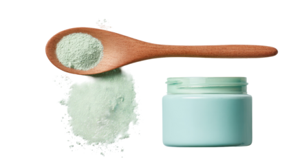 Light teal powder spills from a wooden spoon next to a light teal jar