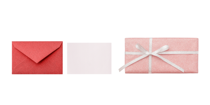 Flat lay of a closed red glitter envelope, a pink message card, and a pink glitter gift