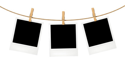 Three blank instant photographs hanging on a clothesline with wooden clothespins against a white background