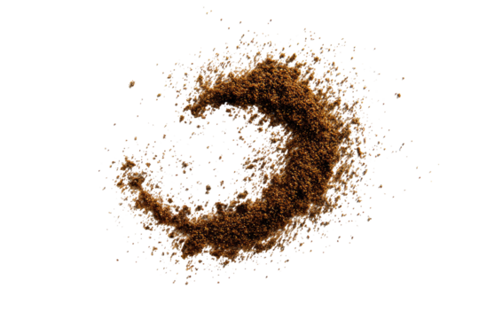 Brown granular substance forms a loose, circular shape, exploding outward from a central point.  Particles vary slightly in color, ranging from light brown to dark reddish-brown