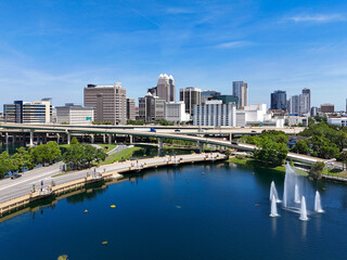 Fototapeta premium View looking over Lake Lucerne and the downtown Orlando skyline with condo and business buildings in Orange County, Orlando, Florida, USA. 