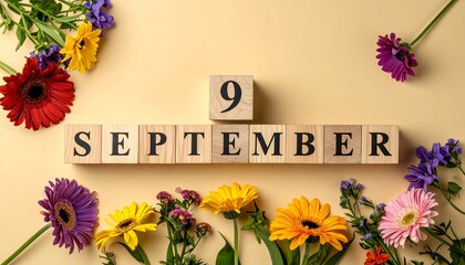 Wooden Blocks with Date 9 September. Floral Calendar – Vibrant Flowers on Solid Colored Background