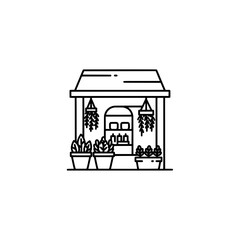 Obraz premium Housefront with potted plants and hanging baskets