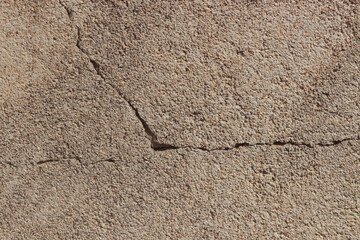 A close up of a cracked wall