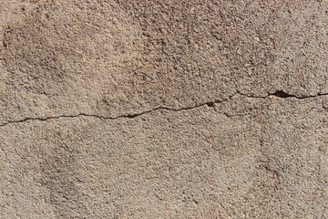 A close up of a cracked wall