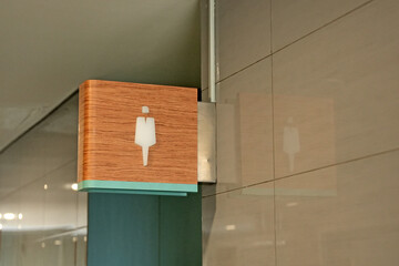 Public toilet signs or symbols at the entrance to the men's and women's toilets
