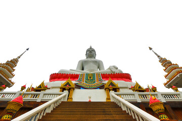A large white Buddha statue in an ornate ancient temple with traditional Buddhist architecture in...