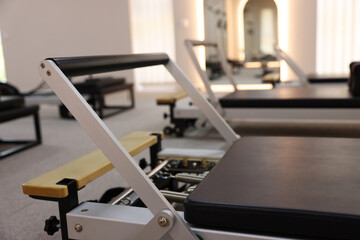 Reformer machines in studio, closeup. Pilates equipment