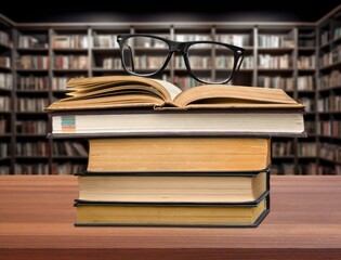 Open book pages in library background