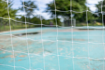 Close-up futsal net,Gate for futsal or handball in gym. Detail of gate frame and net. Outdoor...
