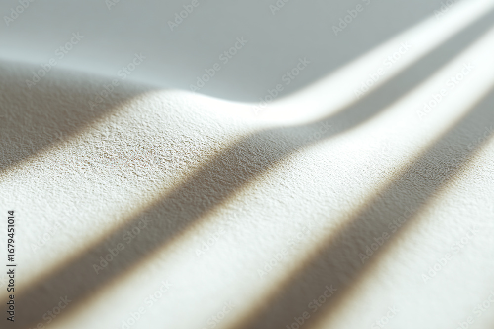 Poster a close-up abstract image of a textured white surface with parallel lines of shadows creating a mini
