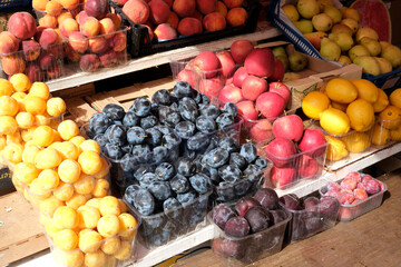Vibrant fruit market display showcases fresh seasonal harvests
