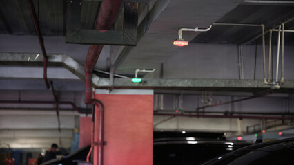 Smart public parking system. A system with green or red light that show if a car parking lot is...