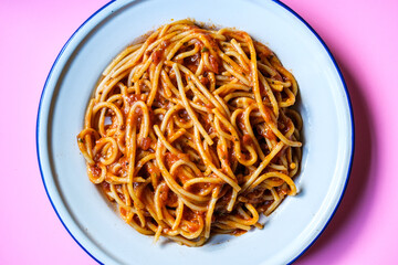 London UK, September 01 2025, Plate of Classic Italian Style Spaghetti Pasta In A Basil and Tomato Sauce With No People