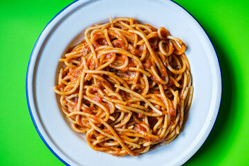 London UK, September 01 2025, Plate of Classic Italian Style Spaghetti Pasta In A Basil and Tomato Sauce With No People