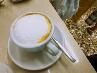 Italian coffee culture with espresso and cappuccino served in white cups, symbol of relaxation,...