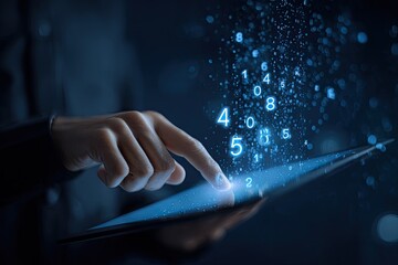 Close-up of a hand interacting with a tablet, displaying floating numbers