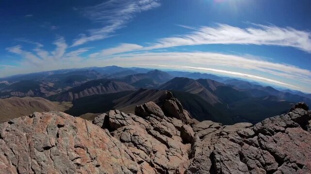 View of the Earth's Curvature as Seen from the Summit of High Rocky Mountain Peak