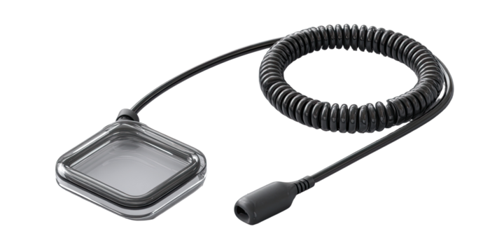 Small, square, clear cover attached to coiled cord