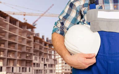 Man worker hand with hard hat