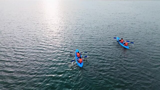 Aerial Drone View of Two Kayaks Rowing on Hikkaduwa Lagoon at Evening Golden Hour