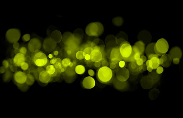 Golden Yellow Bokeh Lights on Black Abstract Glow Background