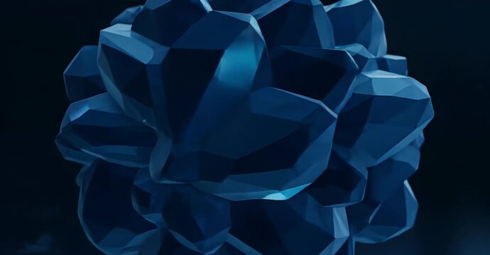Close-up of a faceted, geometric blue crystal mineral formation.