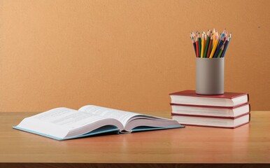 Vintage old stack books on a wooden deck