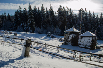 Ski resort in winter, winter wonderland unfolds across this panoramic mountain view. Thick snow...