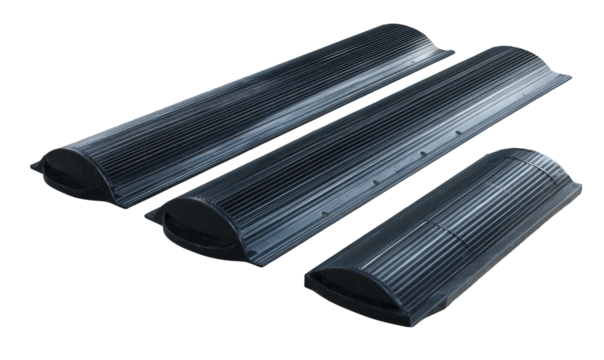 Three curved, ribbed, dark gray/black plastic enclosures of varying lengths, likely for ventilation or light control.  Clear/translucent panels cover the curved surfaces.