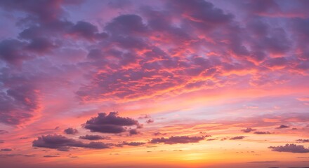 Vibrant Sunset Sky with Dramatic Pink and Purple Clouds