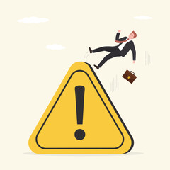 Warning of failure or danger. Businessman slipping and falling from triangle sign with exclamation mark. Loser doing mistake. Unhappy male character.