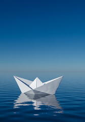 Obraz premium A paper boat floats peacefully on calm, blue water under a clear, cloudless sky, reflecting on the surface.