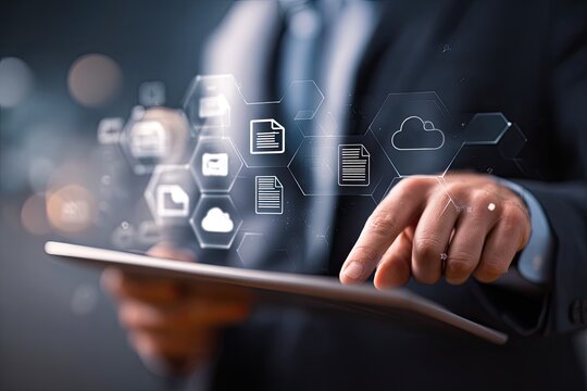 Businessperson using tablet with digital document icons overlaid