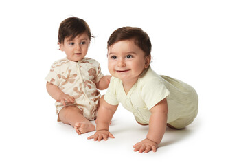 Cute little twin babies on white background