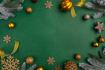 Elegant gold, green, and frosted Christmas decorations form a festive border on green background, perfect for holiday messages or seasonal promotions. Ideal for festive greeting cards, holiday banners