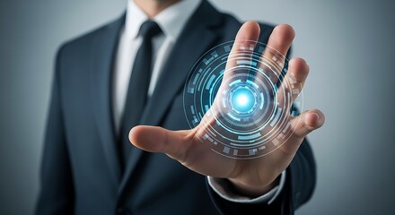 Businessman with digital interface hovering over hand in a suit and tie on grey background