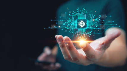 Futuristic visualization of artificial intelligence chip floating above human hand. Concept of AI technology, machine learning, digital transformation, and innovative data processing system.