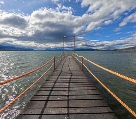 Naklejka premium From the Puerto Natales waterfront, you can see the Última Esperanza fjord, Mount Balmaceda with its glaciers, and a beautiful Patagonian landscape Chile
