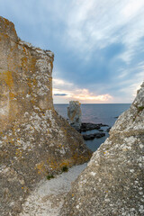 limestones cliffs in Gotladn Digershuvud, dramatic sky