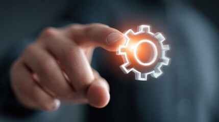 Hand touching a glowing gear