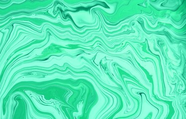 Fototapeta premium abstract background of green and white liquid ink in water closeup