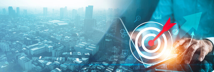 A futuristic business concept image showing a city skyline blended with digital technology, data...