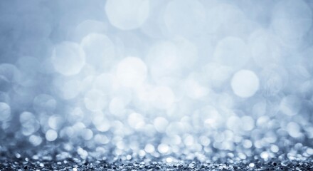 Glitter defocused light silver-blue background