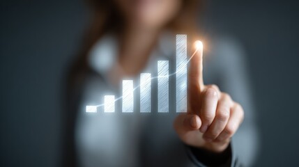 Hand touching a growth graph